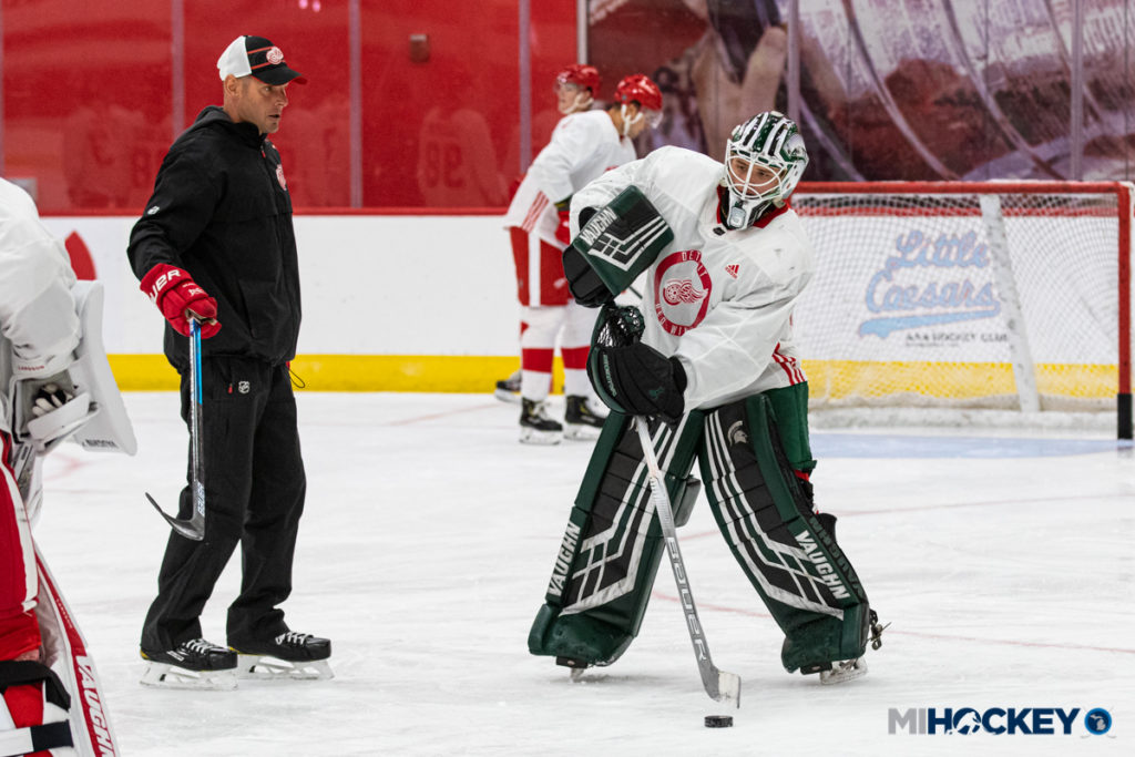 Drew DeRidder with Red Wings coach Jeff Salajko. (Photo by Michael Caples/MiHockey)