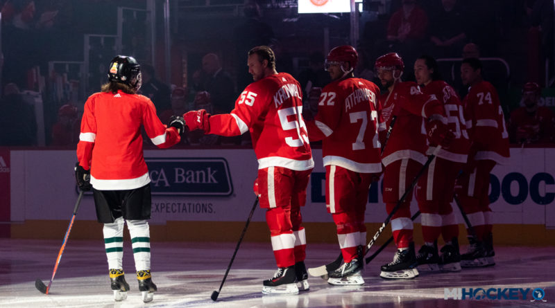 Niklas Kronwall greets a 'Youth Skater of the Game' before a Detroit Red Wings game.